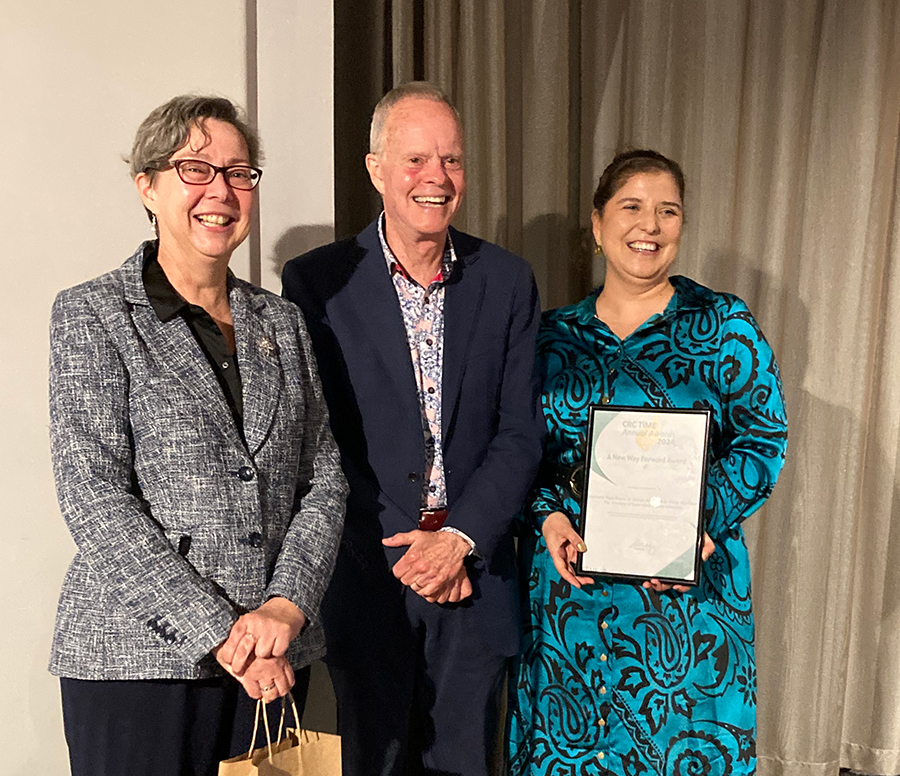 Dr Elaine Wightman, Dr George Barakos and Rosemarie Tapia Riveria accepting the 'A New Way Forward award'.