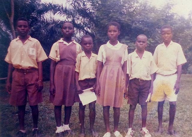 Old sepia photo of Philip Nkrumah accepting award for quiz competition