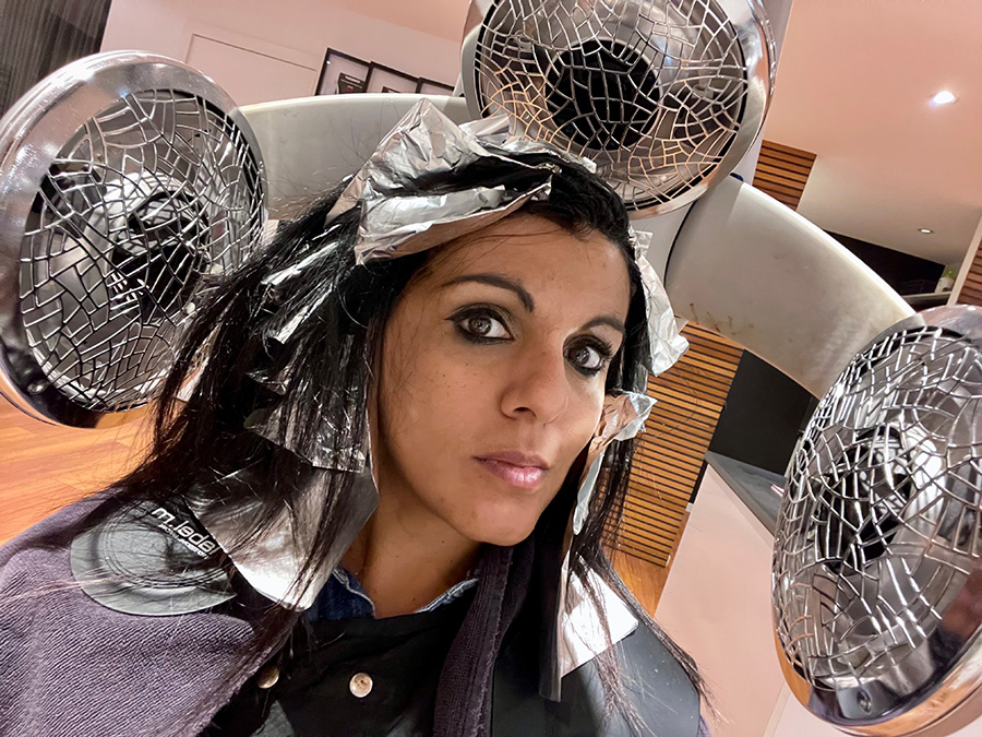 Anita Parbhakar-Fox in hair salon with foils in her hair
