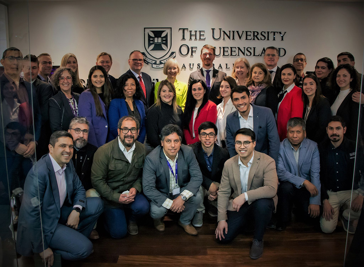 Group from SMI-ICE-Chile office posing with UQ Vice-Chancellor Professor Deborah Terry