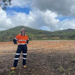 Rosie Blannin dressed in work PPE in the bush