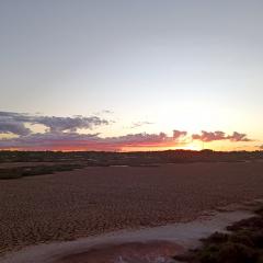 Landscape of the abandoned Ellendale mine at sunset