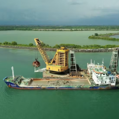 Sea sand is obtained by dredging the bottom. Pictured: a dredging operation off Bali, Indonesia. moonmovie/Shutterstock