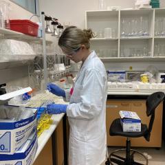 Sabrina Newton acidifying leachates in preparation for ICP-MS  analysis.