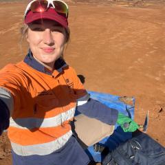 Holly Cooke in PPE fieldwork in South Australia
